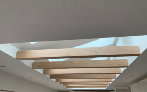 Wrapped ceiling beams