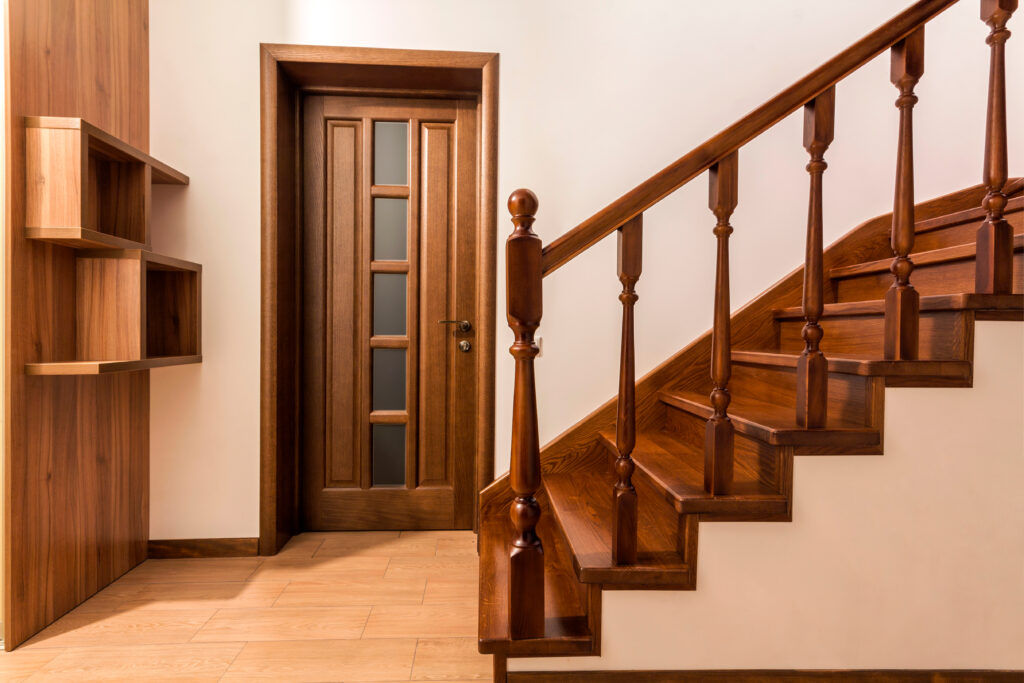 modern,brown,oak,wooden,stairs,and,doors,in,new,renovated