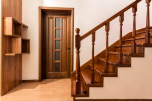 modern,brown,oak,wooden,stairs,and,doors,in,new,renovated